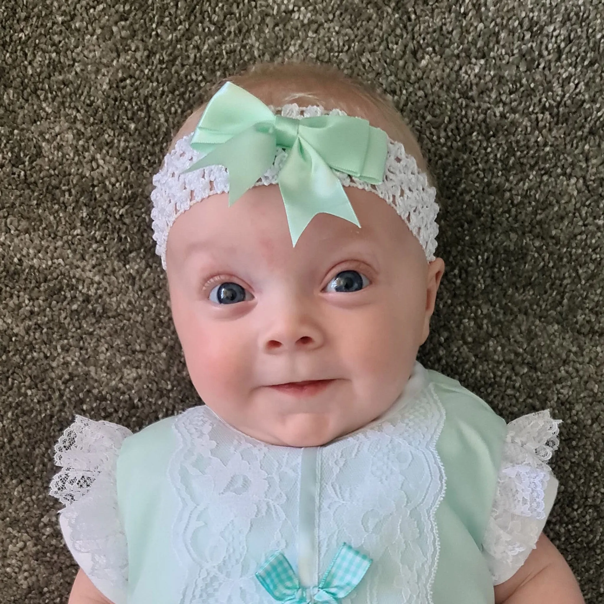 Baby girls crochet headband with mint green satin bow