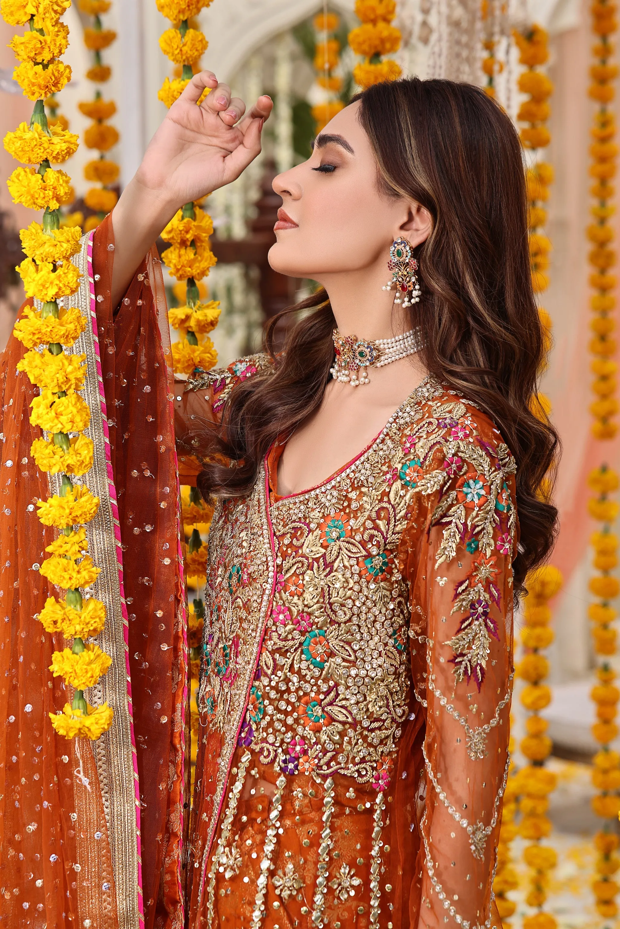 Pakistani Mehndi Dress in Angrakha and Lehenga Style