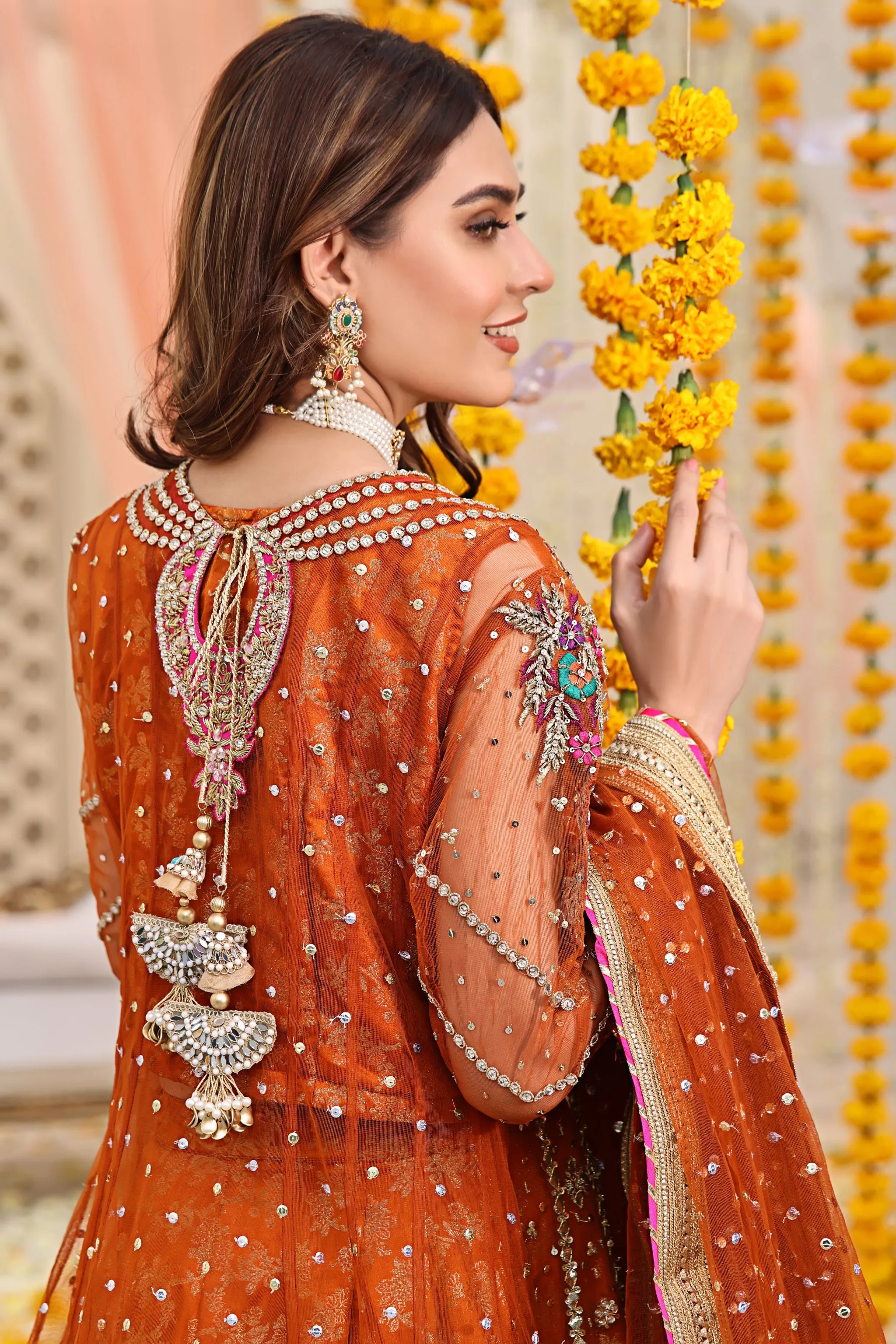 Pakistani Mehndi Dress in Angrakha and Lehenga Style