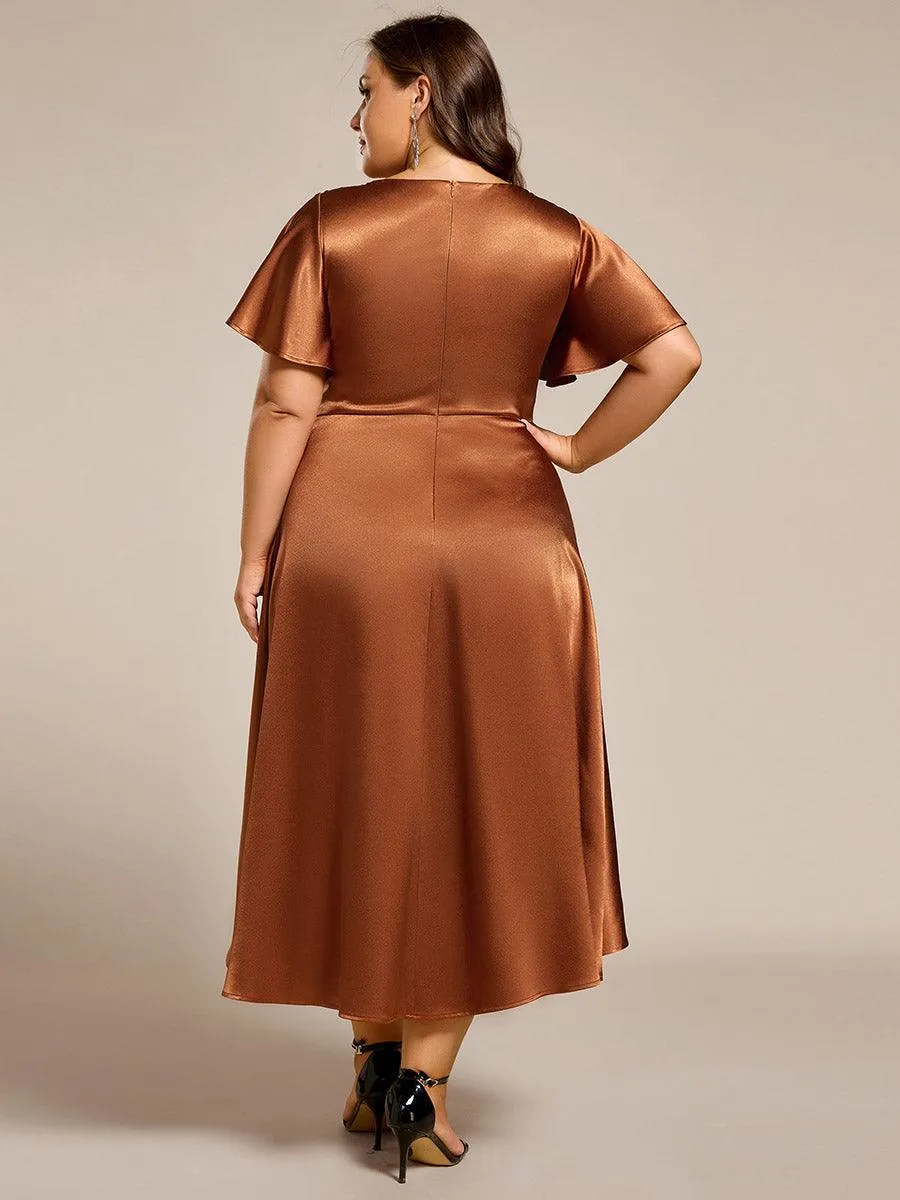 Robe d'invitée mi-longue en satin à ourlet haut-bas