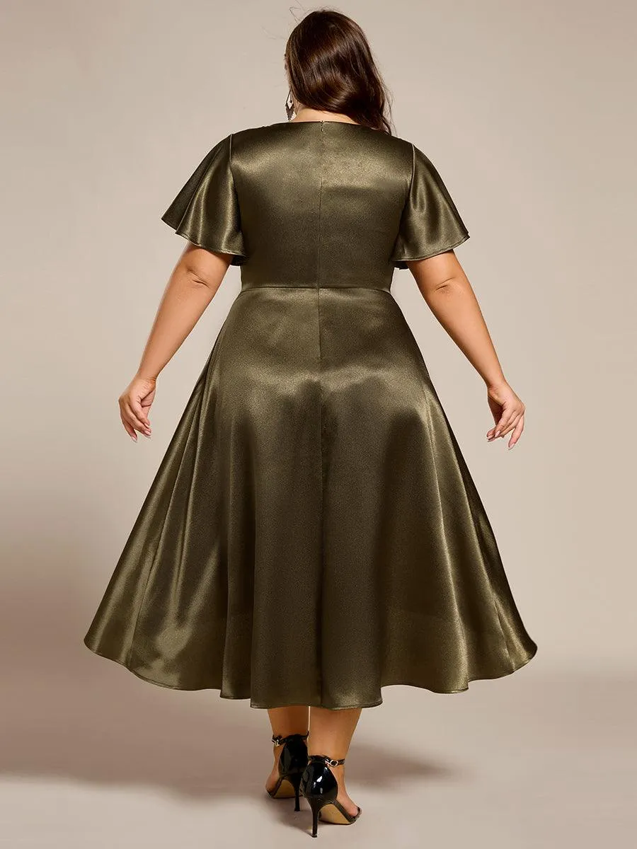 Robe d'invitée mi-longue en satin à ourlet haut-bas
