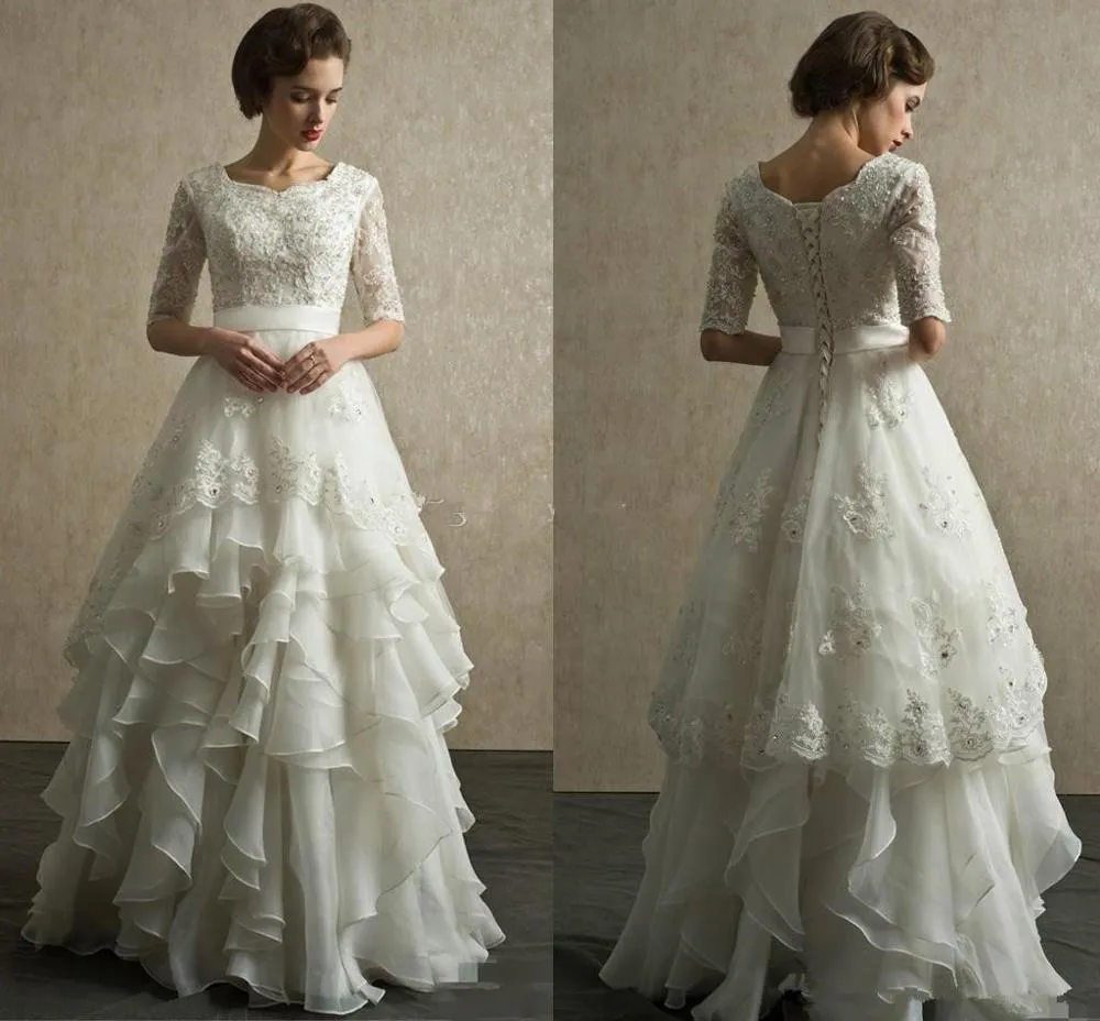 Vintage Wedding Dress With Half Sleeves Organza Appliques And Lots Of Floor Length Ruffles In Skirt